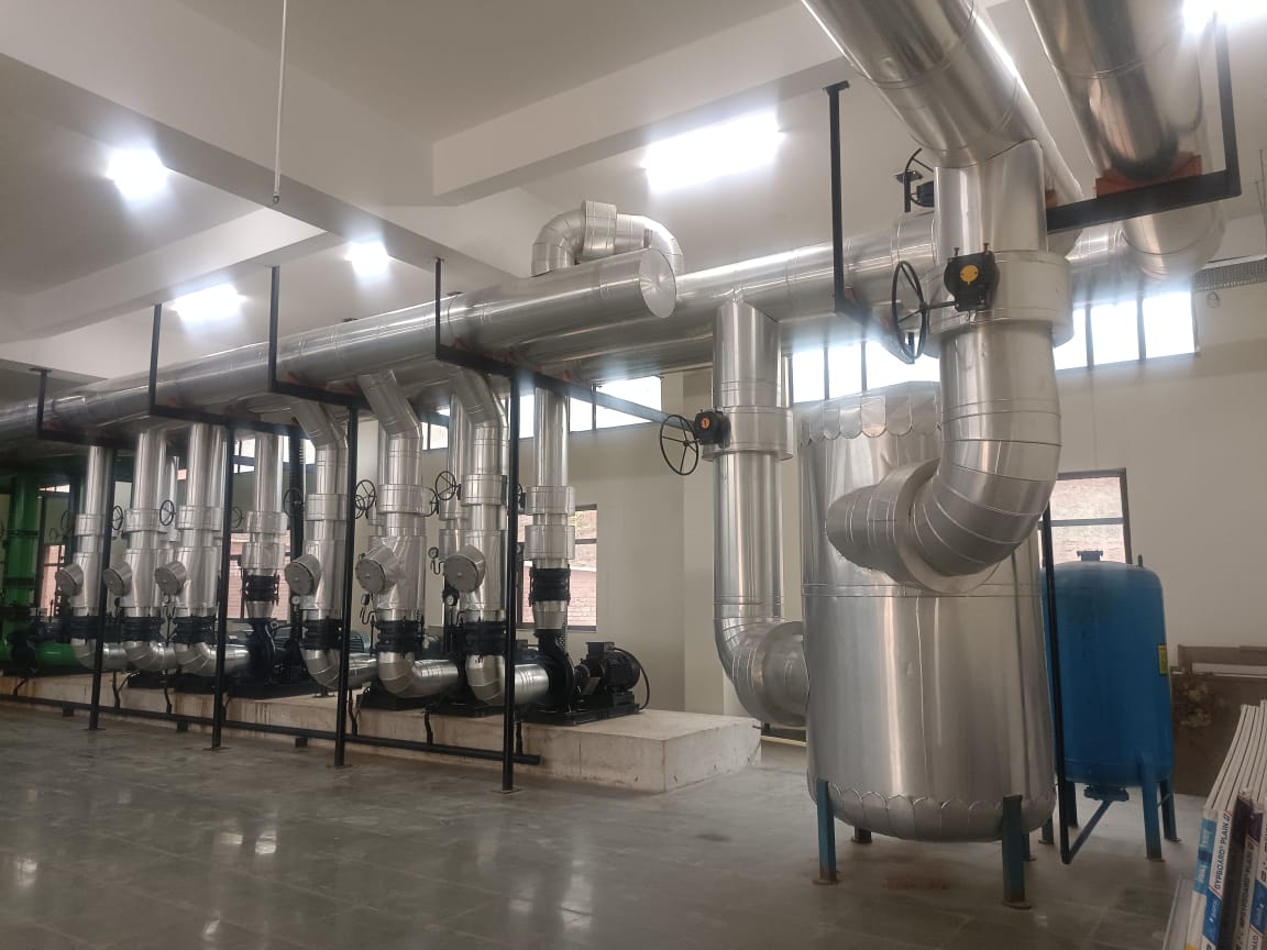 Technician working on HVAC equipment