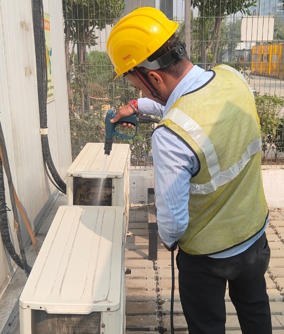 Technician inspecting HVAC equipment