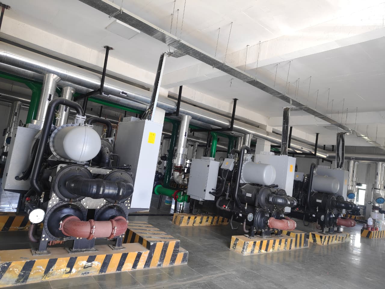 Technicians working on HVAC units